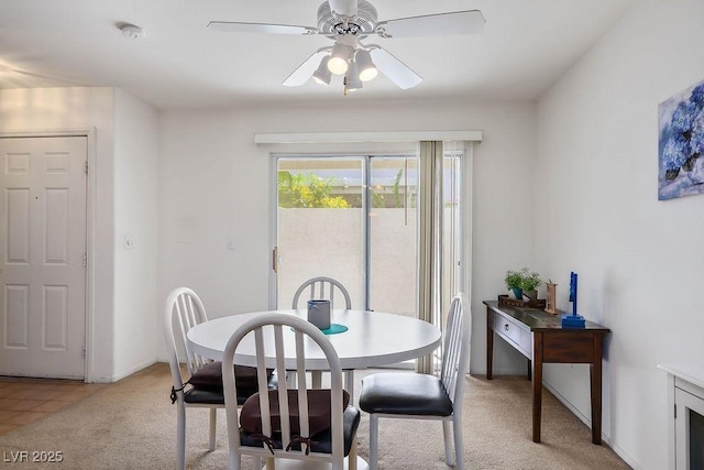 2902 Aztec Lily Ln, Henderson, NV 89074 - dining room with light colored carpet and a ceiling fan