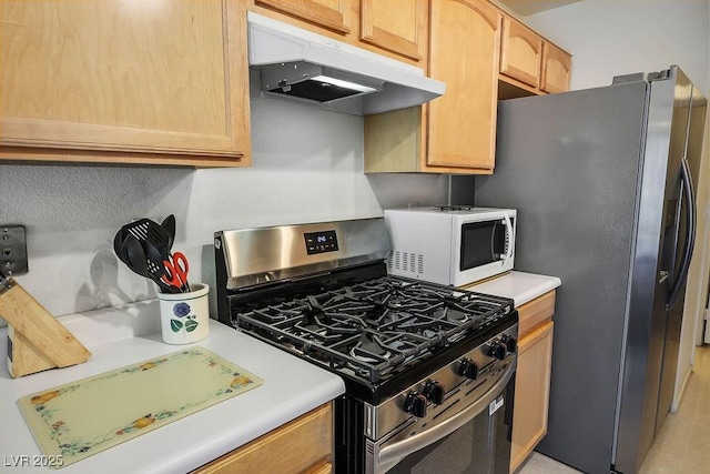 2902 Aztec Lily Ln, Henderson, NV 89074 - kitchen featuring stainless steel gas range oven, under cabinet range hood, white microwave, light countertops, and refrigerator with ice dispenser