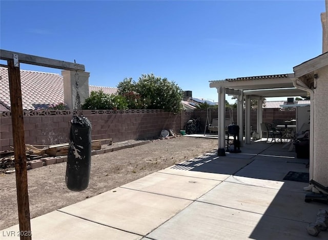 2124 Cabrini Ct, North Las Vegas, NV 89032 - fenced backyard with a patio area