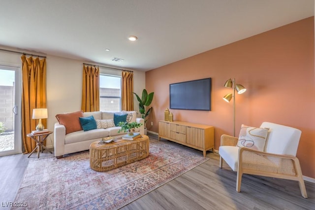 10988 Rollingford Ave Lot 10, Las Vegas, NV 89166 - living room featuring wood finished floors and baseboards