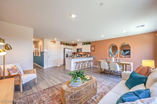 10988 Rollingford Ave Lot 10, Las Vegas, NV 89166 - living area with light wood finished floors and recessed lighting