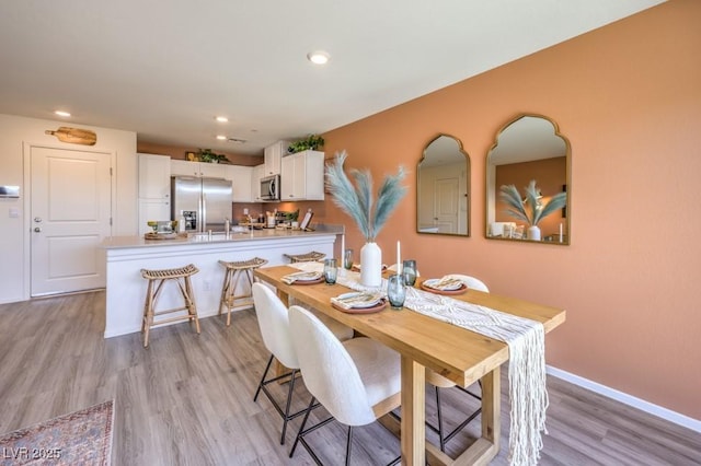 10988 Rollingford Ave Lot 10, Las Vegas, NV 89166 - dining room with light wood-type flooring and recessed lighting