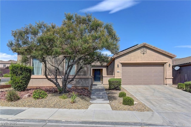 225 Palmetto Pointe Dr, Henderson, NV 89012 - view of front facade featuring an attached garage, concrete driveway, and stucco siding
