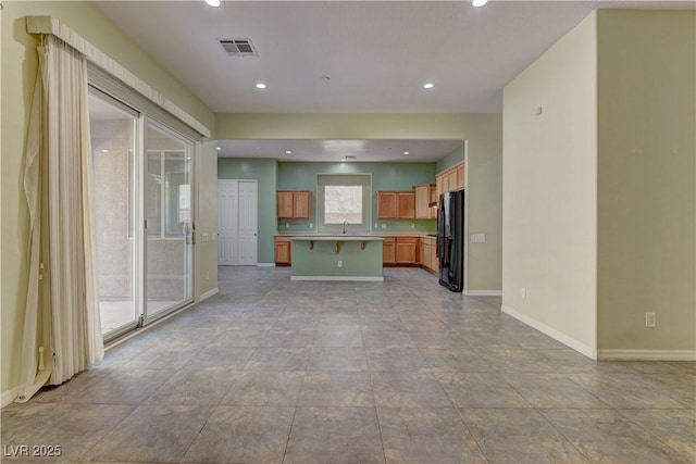 225 Palmetto Pointe Dr, Henderson, NV 89012 - unfurnished living room with baseboards and recessed lighting