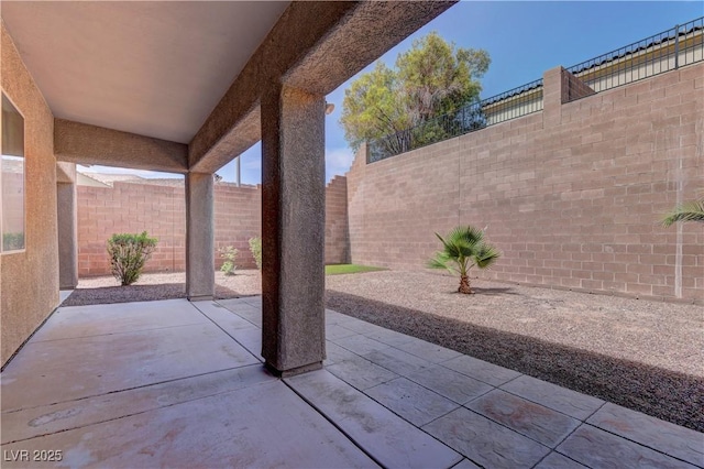 225 Palmetto Pointe Dr, Henderson, NV 89012 - fenced backyard with a patio area