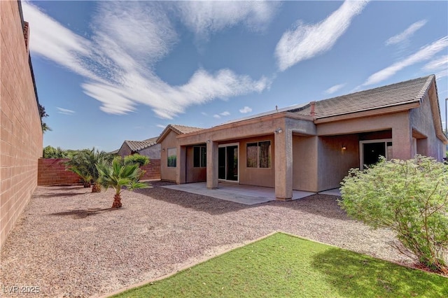 225 Palmetto Pointe Dr, Henderson, NV 89012 - rear view of property with a tile roof, a patio, a fenced backyard, and stucco siding