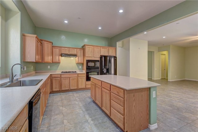 225 Palmetto Pointe Dr, Henderson, NV 89012 - kitchen featuring black appliances, recessed lighting, a kitchen island, light countertops, and under cabinet range hood