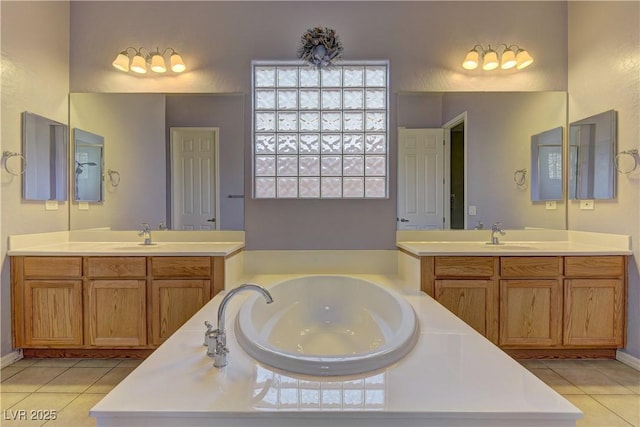 225 Palmetto Pointe Dr, Henderson, NV 89012 - full bathroom featuring tile patterned flooring, two vanities, and a bath