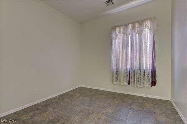 225 Palmetto Pointe Dr, Henderson, NV 89012 - unfurnished room with baseboards and stone finish floors