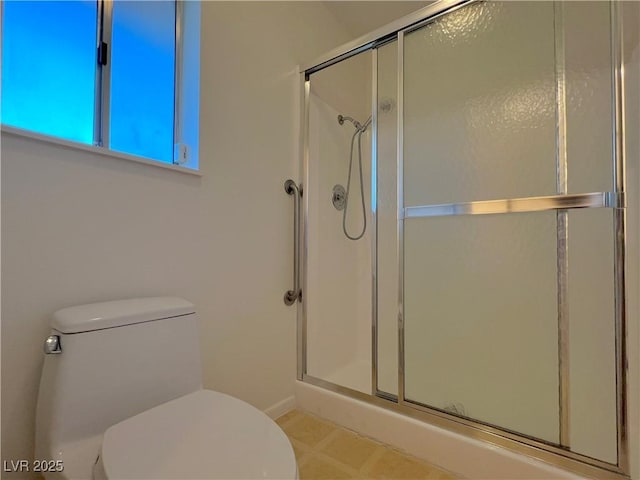 304 Broxton Ln, Las Vegas, NV 89107 - bathroom featuring toilet and a shower with door