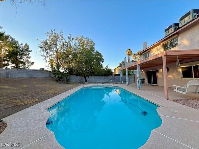304 Broxton Ln, Las Vegas, NV 89107 - view of pool featuring a patio area and a fenced backyard