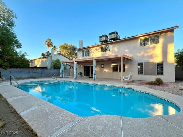 304 Broxton Ln, Las Vegas, NV 89107 - view of swimming pool featuring a patio area, a fenced backyard, and a pool with connected hot tub