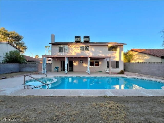304 Broxton Ln, Las Vegas, NV 89107 - view of swimming pool featuring a fenced backyard, a patio area, and a pool with connected hot tub