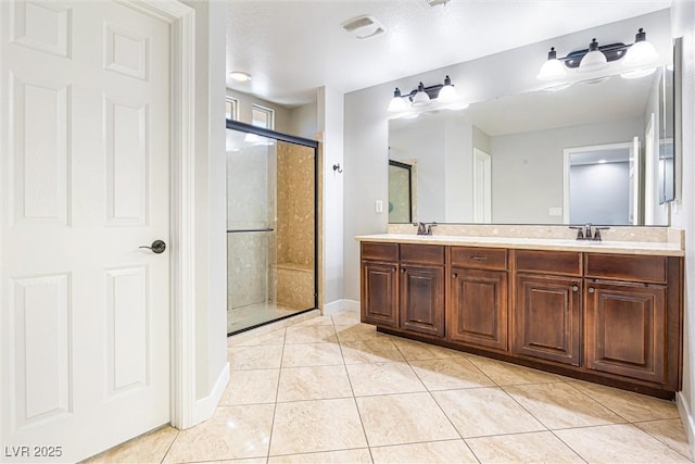 9432 Logan Ridge Ct, Las Vegas, NV 89139 - bathroom with a stall shower, double vanity, and tile patterned flooring