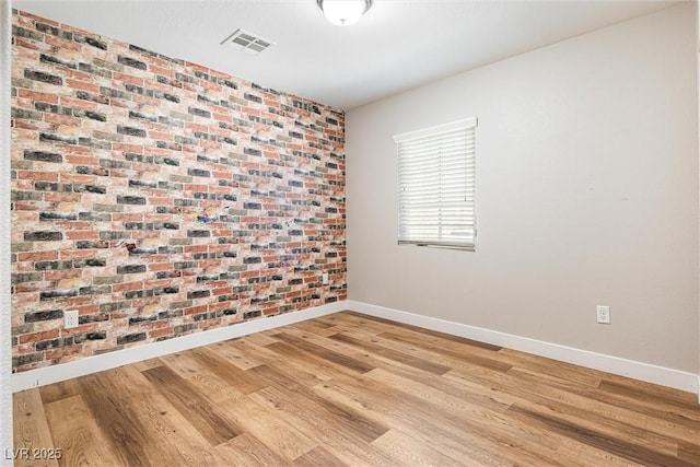 9432 Logan Ridge Ct, Las Vegas, NV 89139 - unfurnished room featuring light wood-style flooring