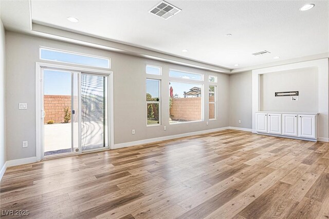 9432 Logan Ridge Ct, Las Vegas, NV 89139 - spare room with light wood-style floors and recessed lighting