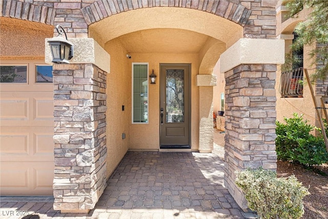 9432 Logan Ridge Ct, Las Vegas, NV 89139 - property entrance with stucco siding and stone siding