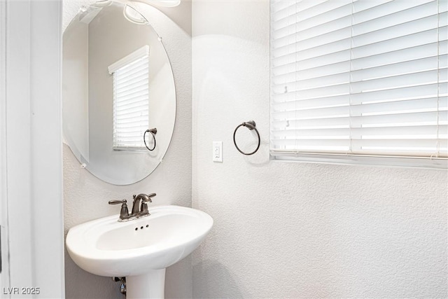 9432 Logan Ridge Ct, Las Vegas, NV 89139 - bathroom with a sink and a textured wall