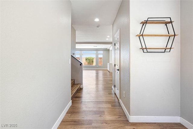 9432 Logan Ridge Ct, Las Vegas, NV 89139 - hall featuring wood finished floors, stairway, and recessed lighting
