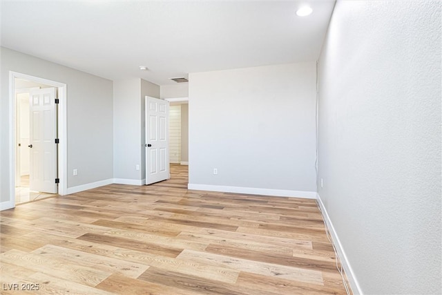 9432 Logan Ridge Ct, Las Vegas, NV 89139 - spare room featuring light wood finished floors and recessed lighting