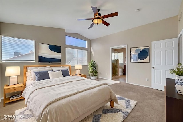 1424 Colt Dr, Henderson, NV 89002 - carpeted bedroom featuring vaulted ceiling, connected bathroom, and a ceiling fan