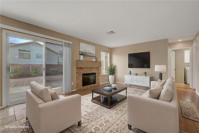 1424 Colt Dr, Henderson, NV 89002 - living room featuring baseboards and a glass covered fireplace