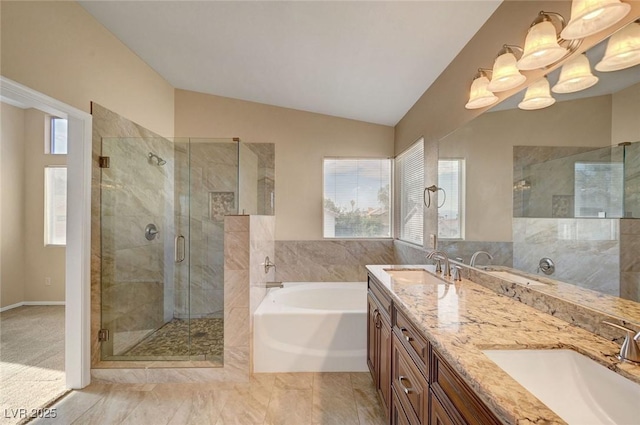 1424 Colt Dr, Henderson, NV 89002 - full bath featuring a garden tub, a stall shower, lofted ceiling, and double vanity