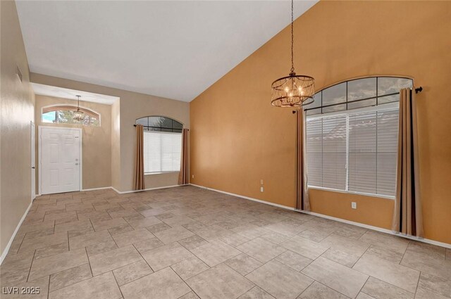 1424 Colt Dr, Henderson, NV 89002 - unfurnished room featuring a chandelier and high vaulted ceiling