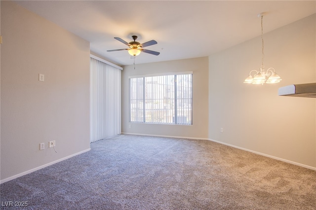 7167 Durango Dr Unit 111, Las Vegas, NV 89148 - unfurnished room with carpet flooring, a chandelier, and a ceiling fan