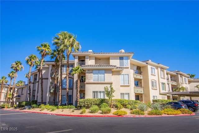7167 Durango Dr Unit 111, Las Vegas, NV 89148 - view of property featuring parking