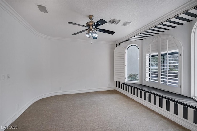 81 Quail Run Rd, Henderson, NV 89014 - spare room featuring carpet flooring, a ceiling fan, a textured ceiling, and crown molding