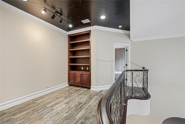 81 Quail Run Rd, Henderson, NV 89014 - corridor featuring wood finished floors, ornamental molding, an upstairs landing, and wooden ceiling