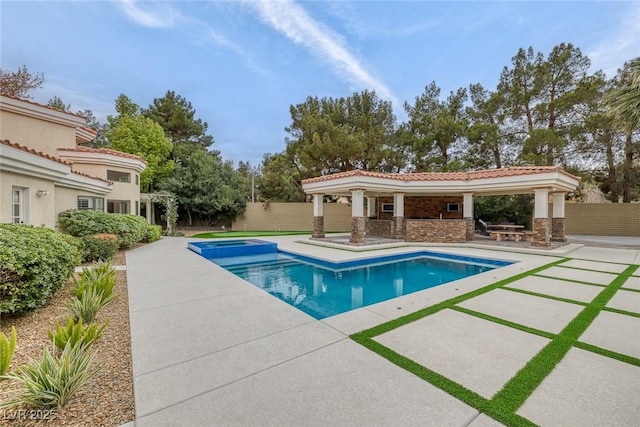 81 Quail Run Rd, Henderson, NV 89014 - view of swimming pool with an in-ground hot tub, a patio, a fenced backyard, and a gazebo