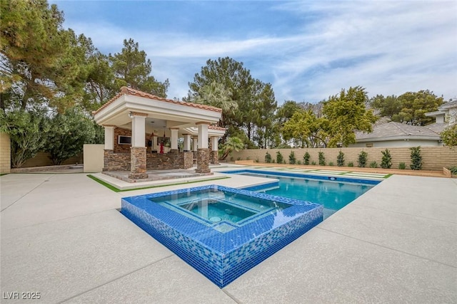 81 Quail Run Rd, Henderson, NV 89014 - view of pool featuring a patio area, a fenced backyard, a gazebo, and a pool with connected hot tub