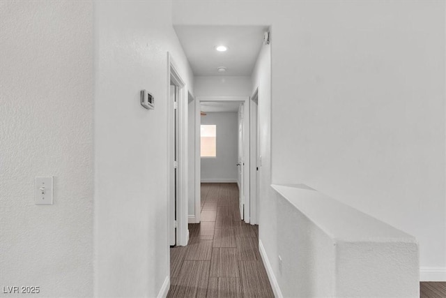 658 Turtleback Dr, North Las Vegas, NV 89031 - hallway featuring baseboards and wood finished floors