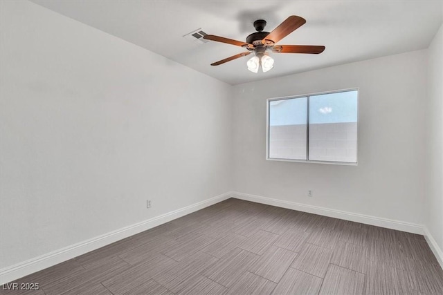 658 Turtleback Dr, North Las Vegas, NV 89031 - spare room featuring baseboards and ceiling fan