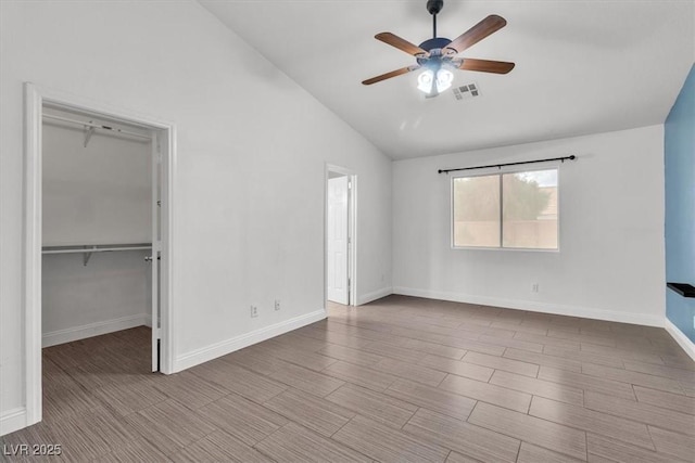 658 Turtleback Dr, North Las Vegas, NV 89031 - unfurnished bedroom with lofted ceiling, a spacious closet, ceiling fan, and a closet