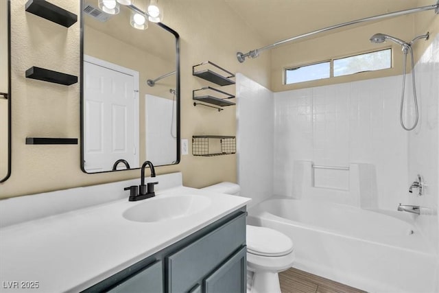 658 Turtleback Dr, North Las Vegas, NV 89031 - bathroom featuring shower / washtub combination, vanity, and wood finished floors