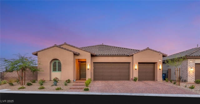 186 Vista Balla Ave, Las Vegas, NV 89138 - mediterranean / spanish-style home with stucco siding, a garage, driveway, and a tile roof