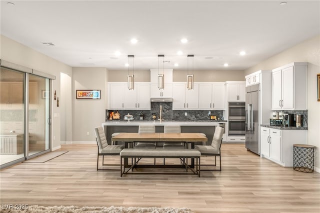 186 Vista Balla Ave, Las Vegas, NV 89138 - dining room featuring light wood-style flooring and recessed lighting