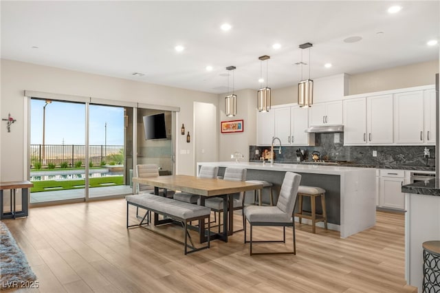 186 Vista Balla Ave, Las Vegas, NV 89138 - dining room with light wood-style floors and recessed lighting