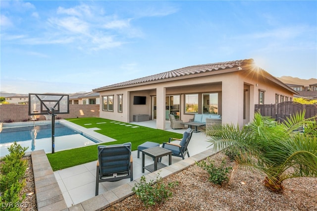186 Vista Balla Ave, Las Vegas, NV 89138 - back of property featuring stucco siding, a fenced backyard, and a patio