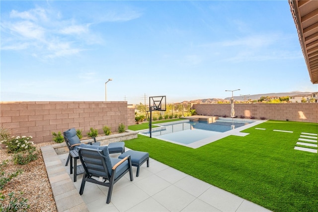 186 Vista Balla Ave, Las Vegas, NV 89138 - fenced backyard featuring a patio