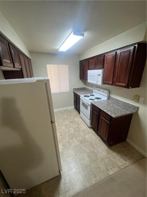 5350 River Glen Dr Unit 298, Las Vegas, NV 89103 - kitchen featuring white appliances and light countertops
