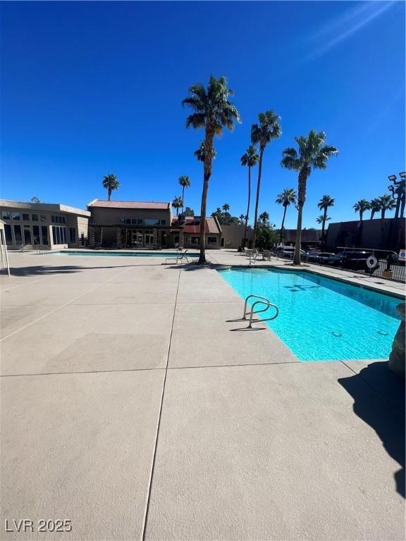 5350 River Glen Dr Unit 298, Las Vegas, NV 89103 - community pool with a patio area