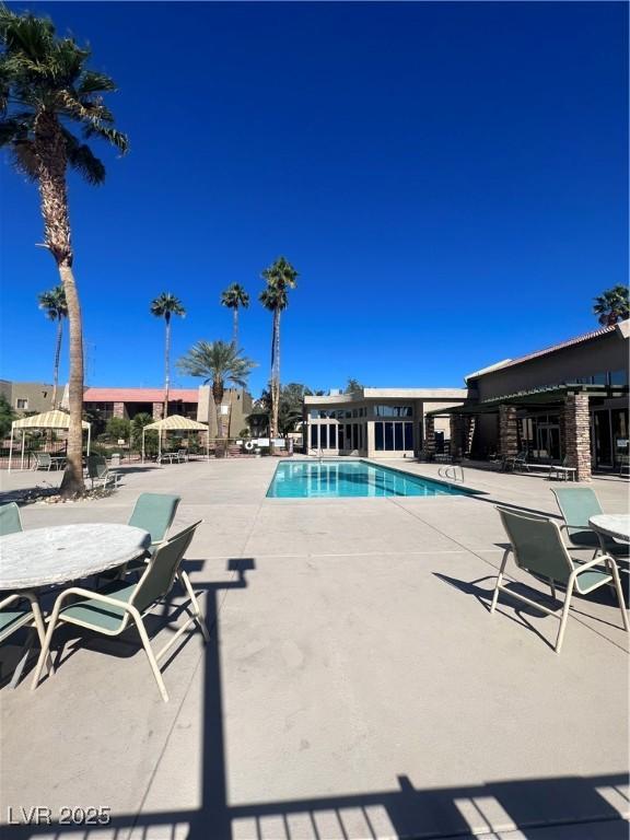 5350 River Glen Dr Unit 298, Las Vegas, NV 89103 - community pool featuring a patio area