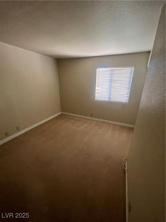 5350 River Glen Dr Unit 298, Las Vegas, NV 89103 - empty room featuring carpet floors and baseboards