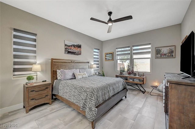 9940 Heather Moore Ave, Las Vegas, NV 89166 - bedroom with baseboards and a ceiling fan