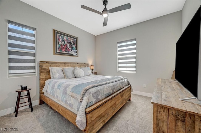 9940 Heather Moore Ave, Las Vegas, NV 89166 - bedroom with multiple windows, carpet floors, and ceiling fan
