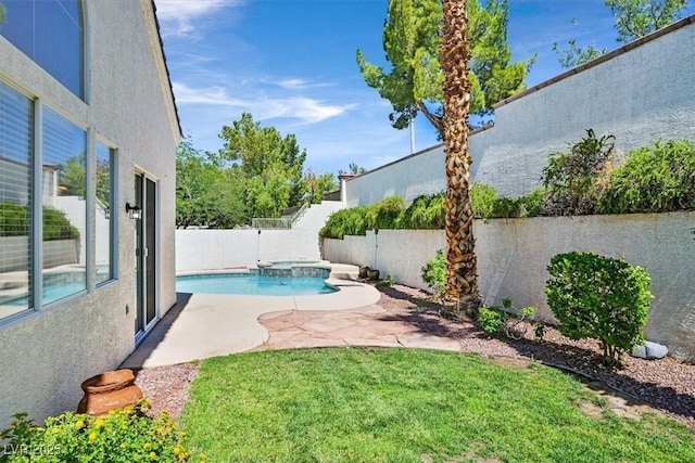 20 Staghorn St, Henderson, NV 89012 - view of pool featuring a fenced backyard, a patio area, and a pool with connected hot tub